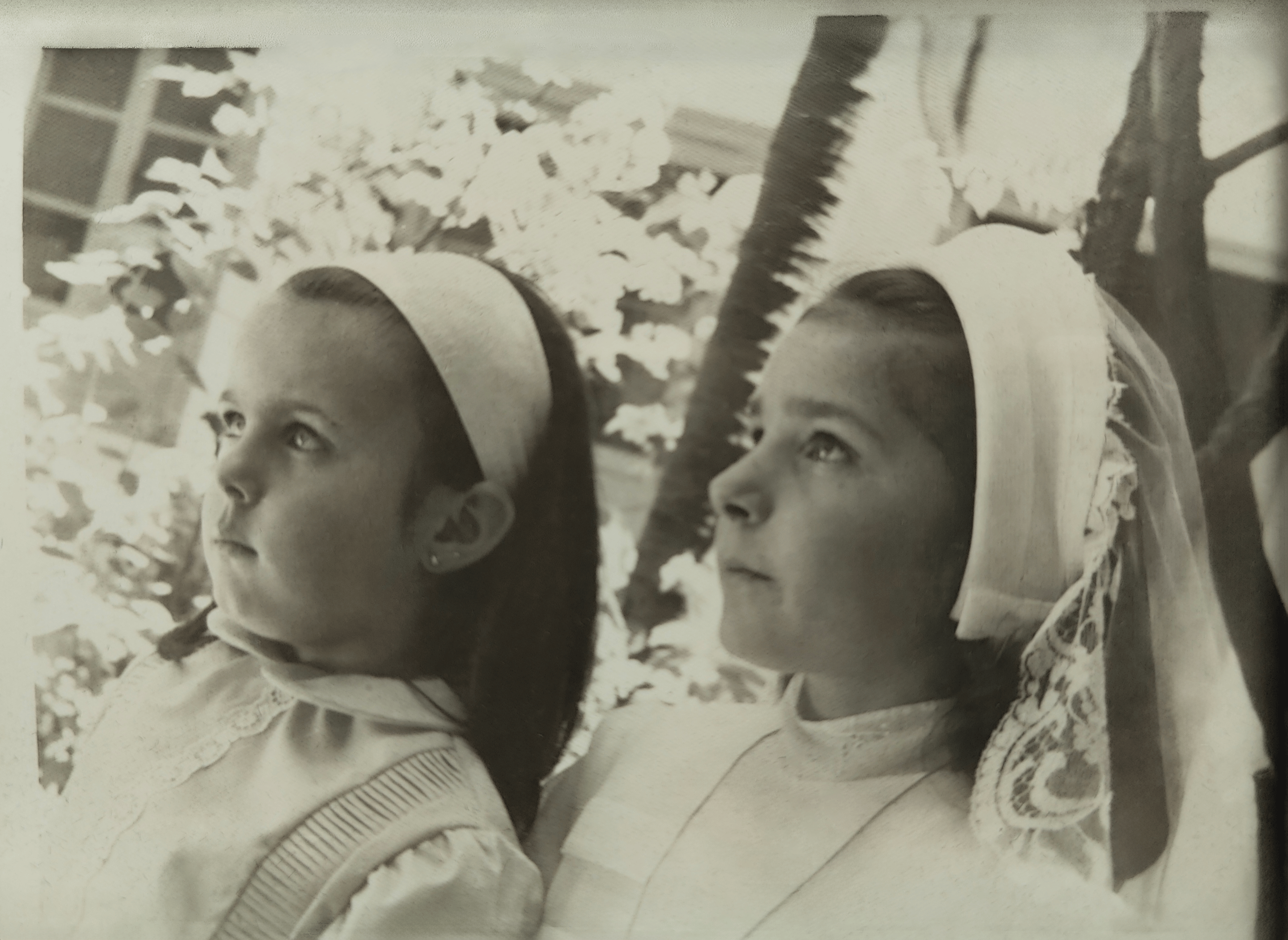 Old faded photo with scratches and color damage before restoration